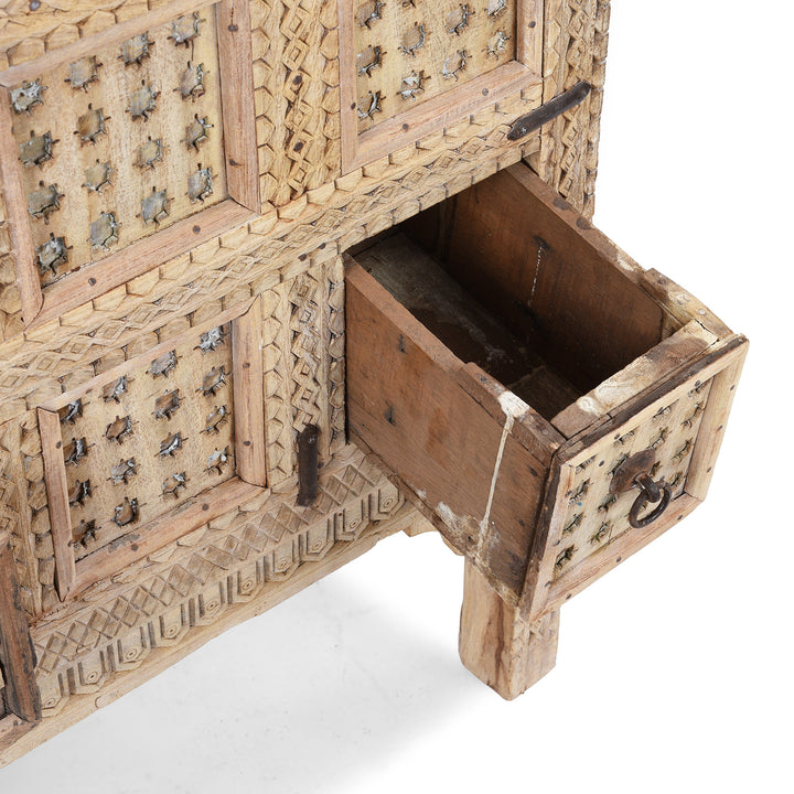 Open Drawer Detail From Bleached Teak Indian Damchiya Chest With Intricate Hand-Carved Geometric Patterns And Hidden Tribal Compartments