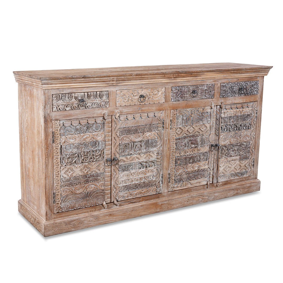 Angled View Of Reclaimed Hand Carved Teak Sideboard With Four Drawers And Removable Shelves From Rajasthan And Gujarat | Indigo Antiques