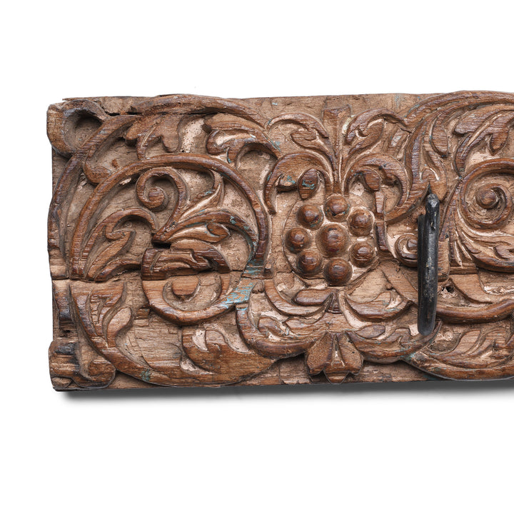 Floral Carving Detail From Indian Carved Teak Coat Hook With Floral Panels And Iron Hooks
