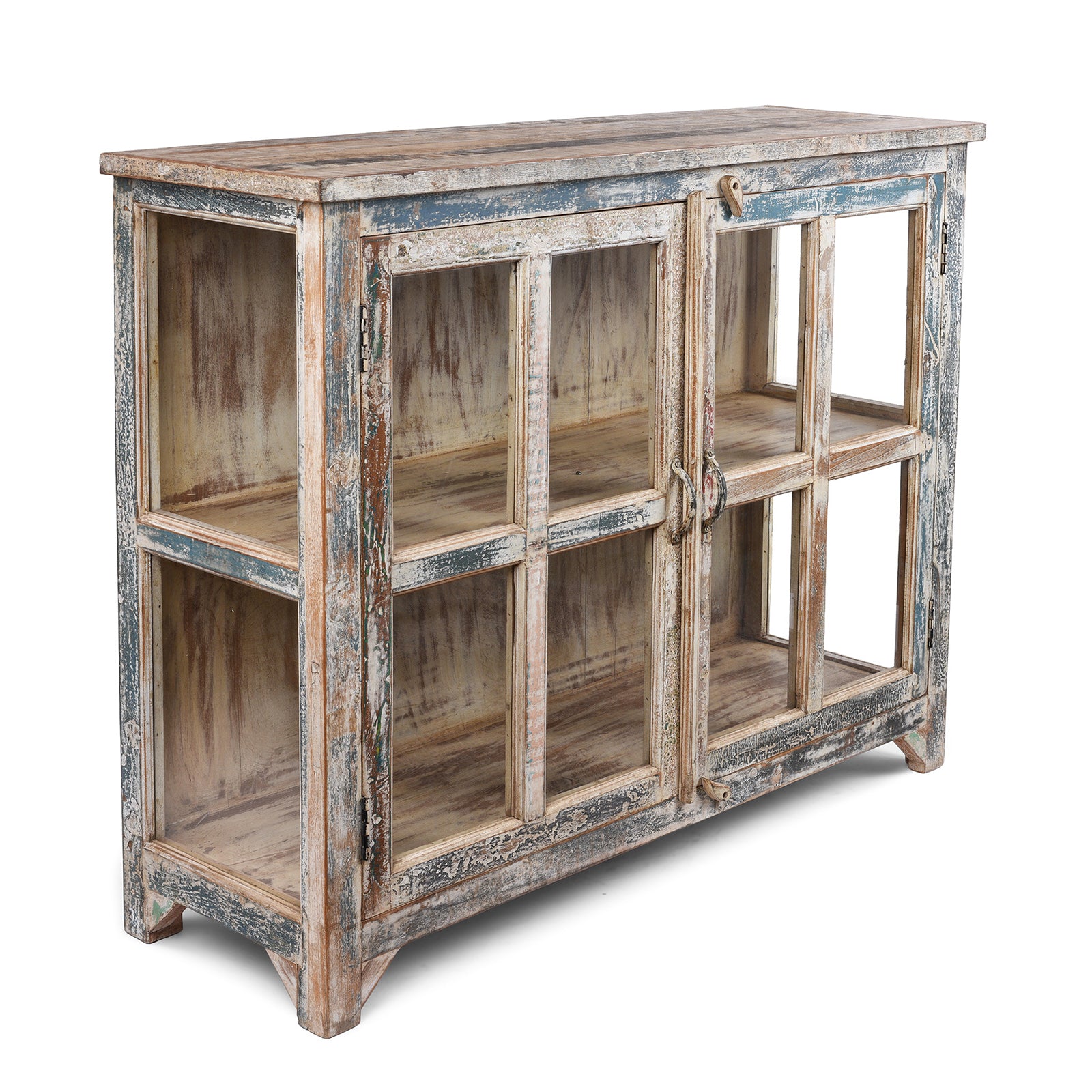 Angled View Of Glazed Display Cabinet With Distressed Finish, Reclaimed South Indian Teak, Two Doors, And Painted Interior With Shelf