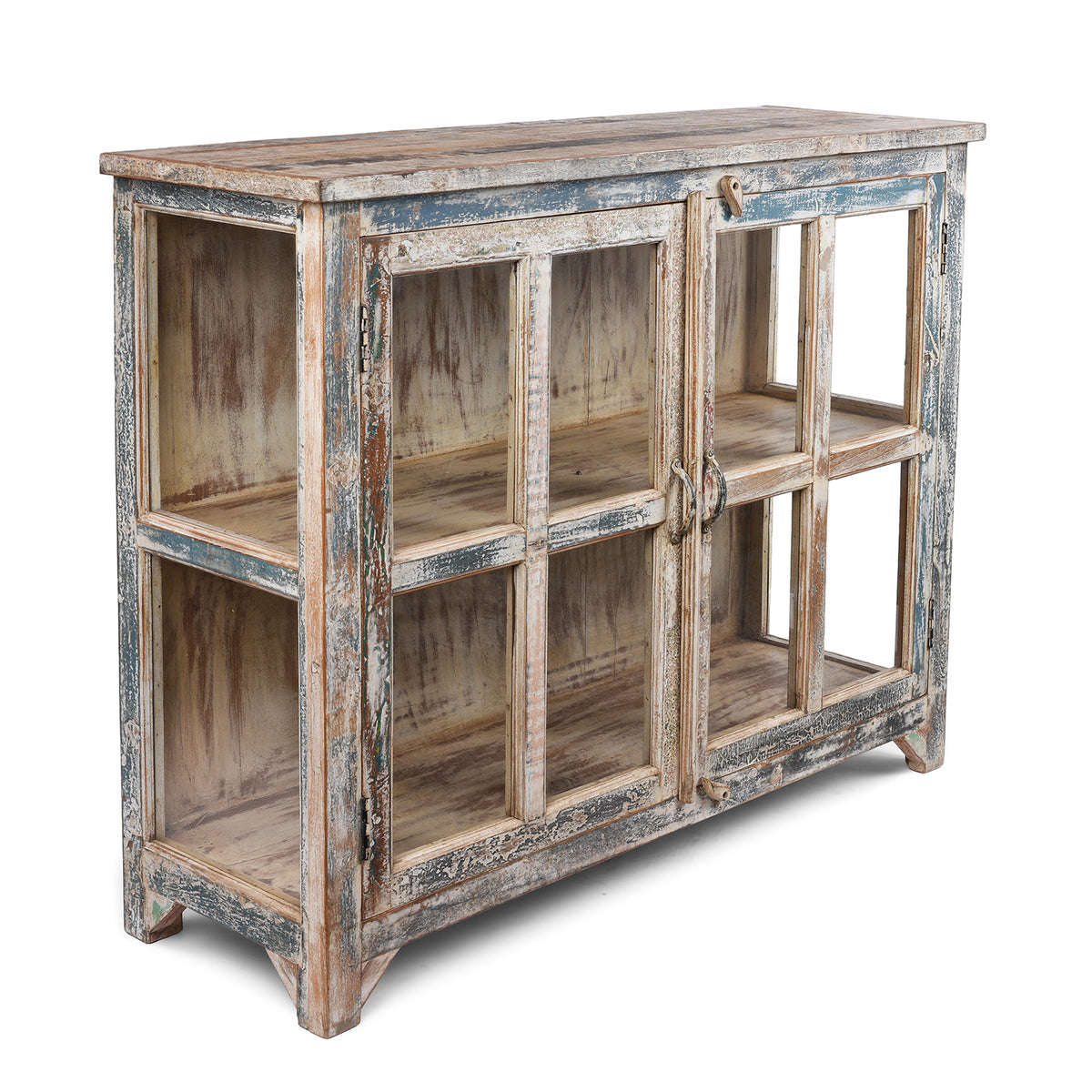 Angled View Of Glazed Display Cabinet With Distressed Finish, Reclaimed South Indian Teak, Two Doors, And Painted Interior With Shelf