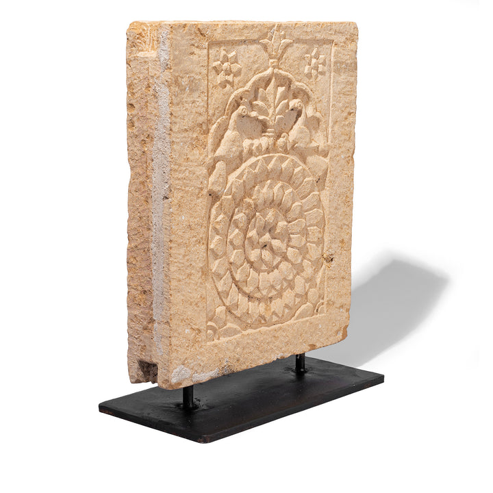 Angled View Of Early 19th Century Jaisalmer Golden Limestone Carved Panel With Peacocks And Lotus Flower On Iron Stand