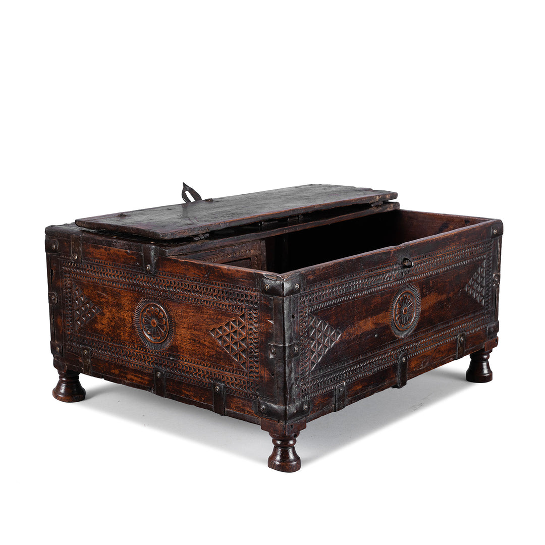 Angled View Of 19th Century Rajasthani Teak Chip Carved Merchant’s Box With Hidden Compartment And Iron Fittings