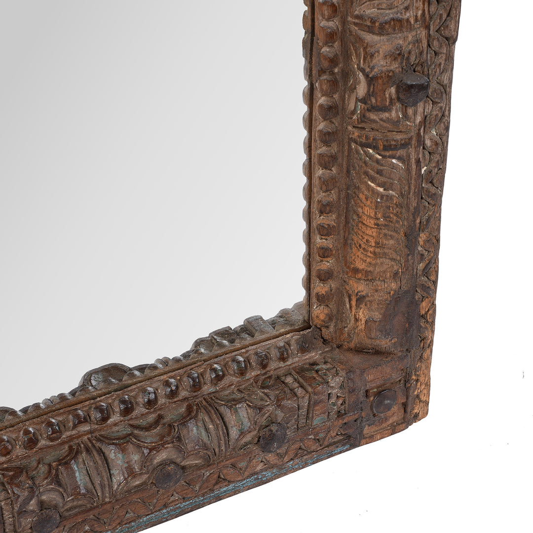 Detail Of Paintwork From Antique Indian Teak Mirror With Intricately Carved Frame Made From Reclaimed Wood
