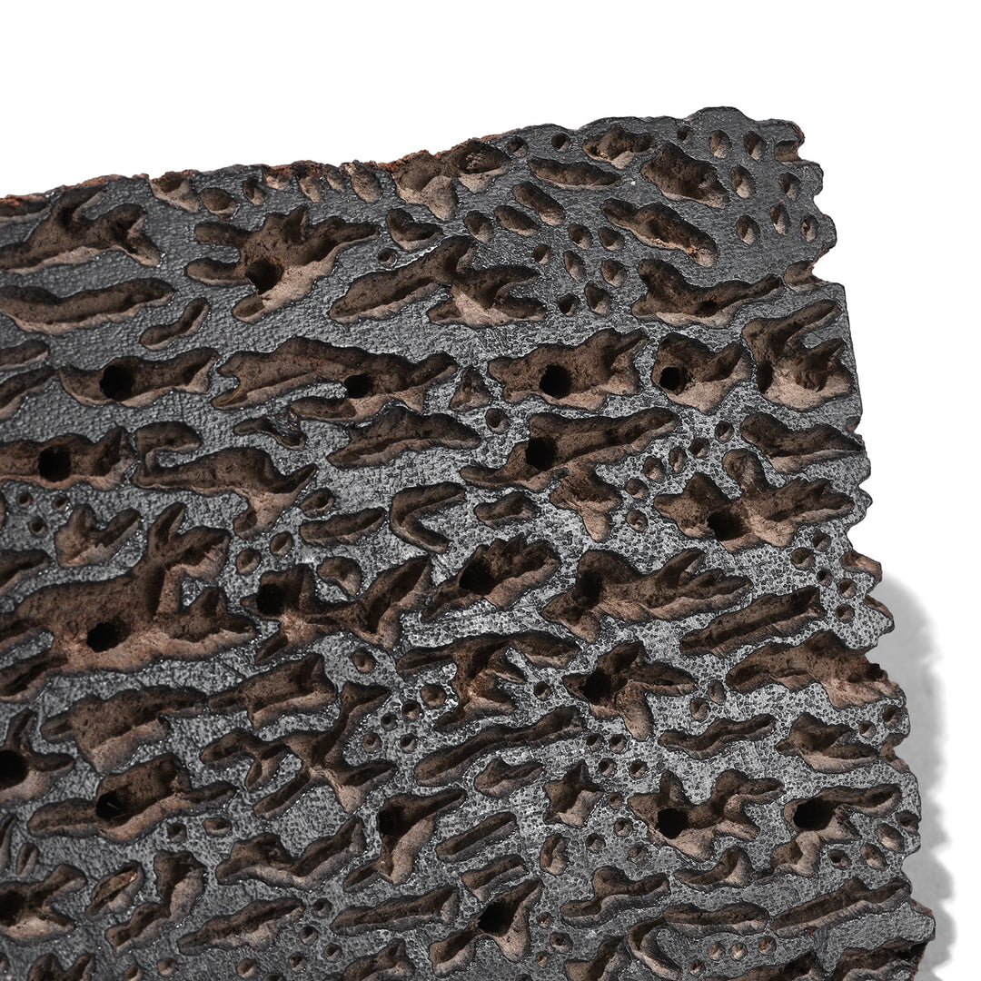 Detailed View Of Old Textile Printing Block From Jaipur With Intricate Carved Pattern
