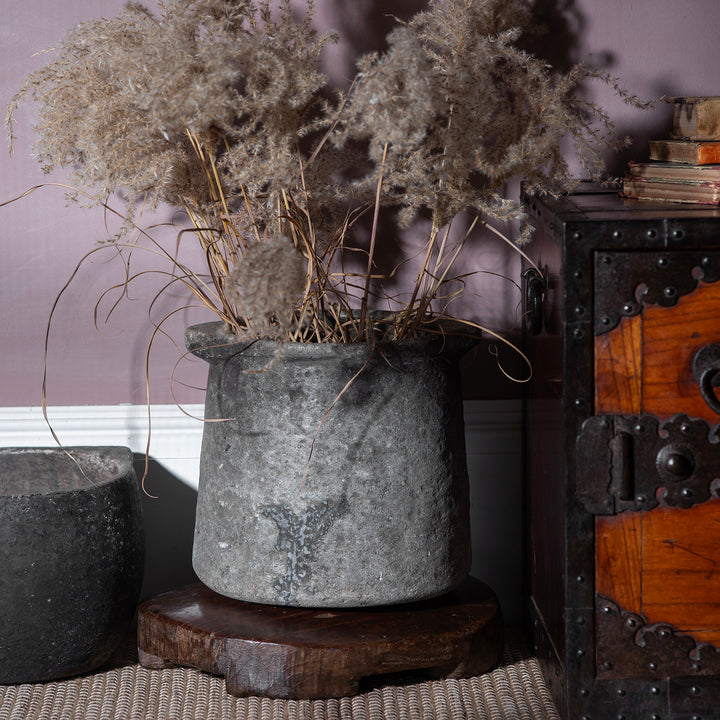 Lifestyle Of Carved Stone South Indian Pot With Thick Walls And Weathered Surface