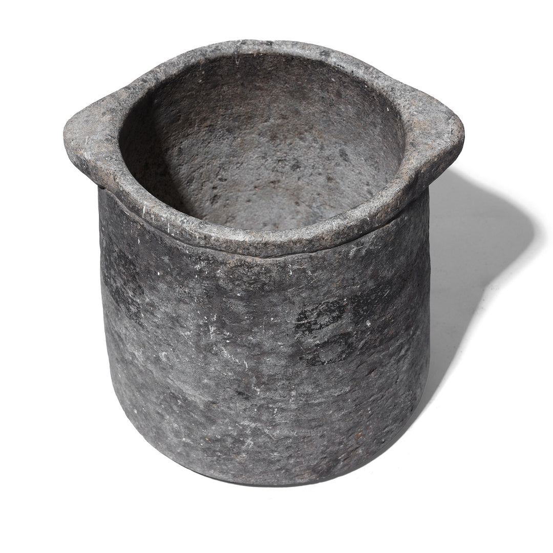 Interior View Of Carved Stone South Indian Pot With Thick Walls And Weathered Surface