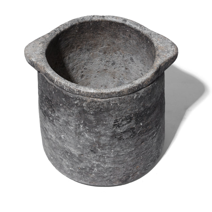 Interior View Of Carved Stone South Indian Pot With Thick Walls And Weathered Surface