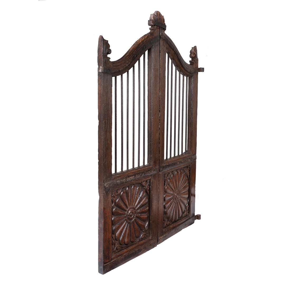 Angled VIew Of Carved Teak Dog Gates From Gujarat With Floral And Sunburst Panels 19th Century