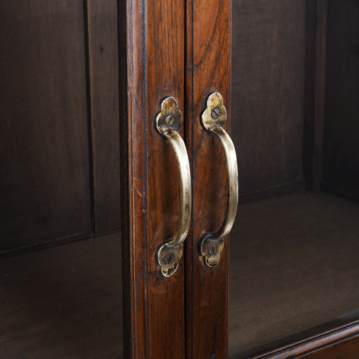 Handle Detail From Antique Anglo-Indian teak book cabinet from Gujarat, circa 1910, with glazed doors and three interior shelves