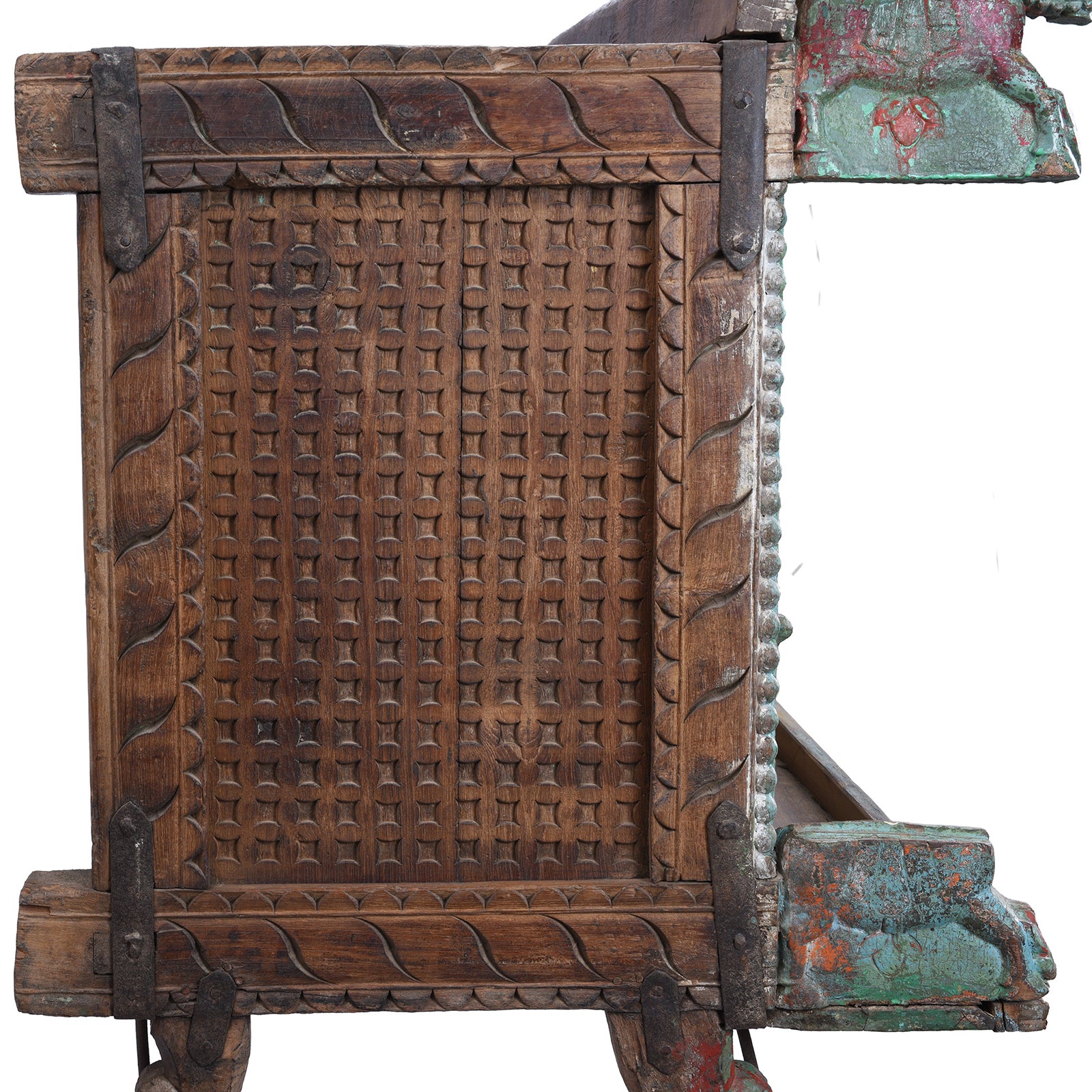 Side View Of Antique Gujarati Majus Dowry Chest With Painted Floral Carving And Horse Head Finials