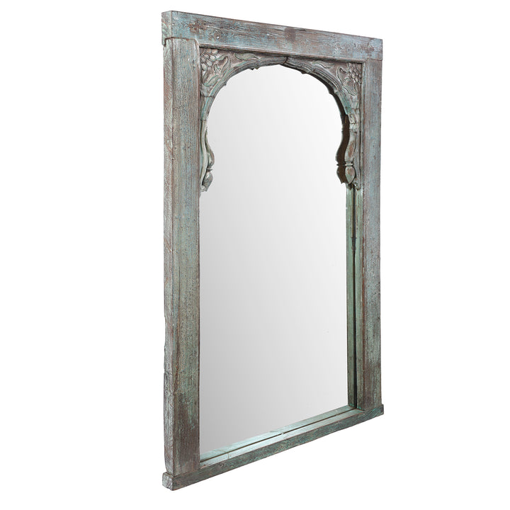 Angled view Of Antique Indian Blue Painted Teak Window Arch Mirror | Indigo Antiques