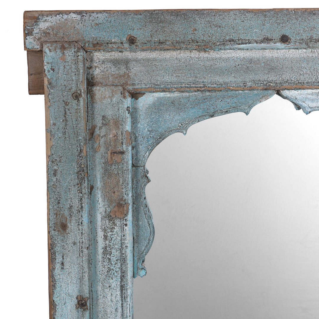 Corner Carving Detail From Antique Indian Teak Mirror With Mughal Arch And Carved Base Panel In Distressed Blue Paint
