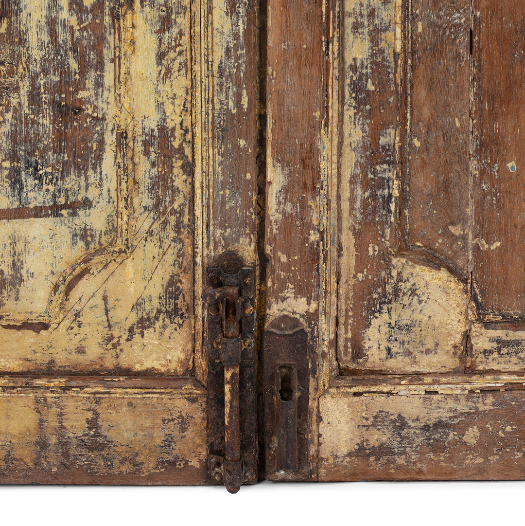 Lock Detail From Yellow Painted Indian Door From Gujarat With Distressed Original Paint And Glass Panels