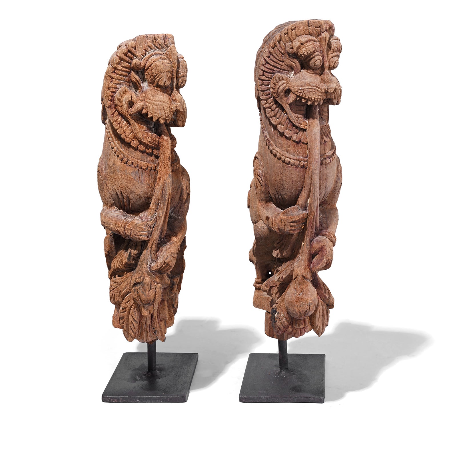 Front View Of Antique Indian Carved Yali Figures On Stands | Indigo Antiques