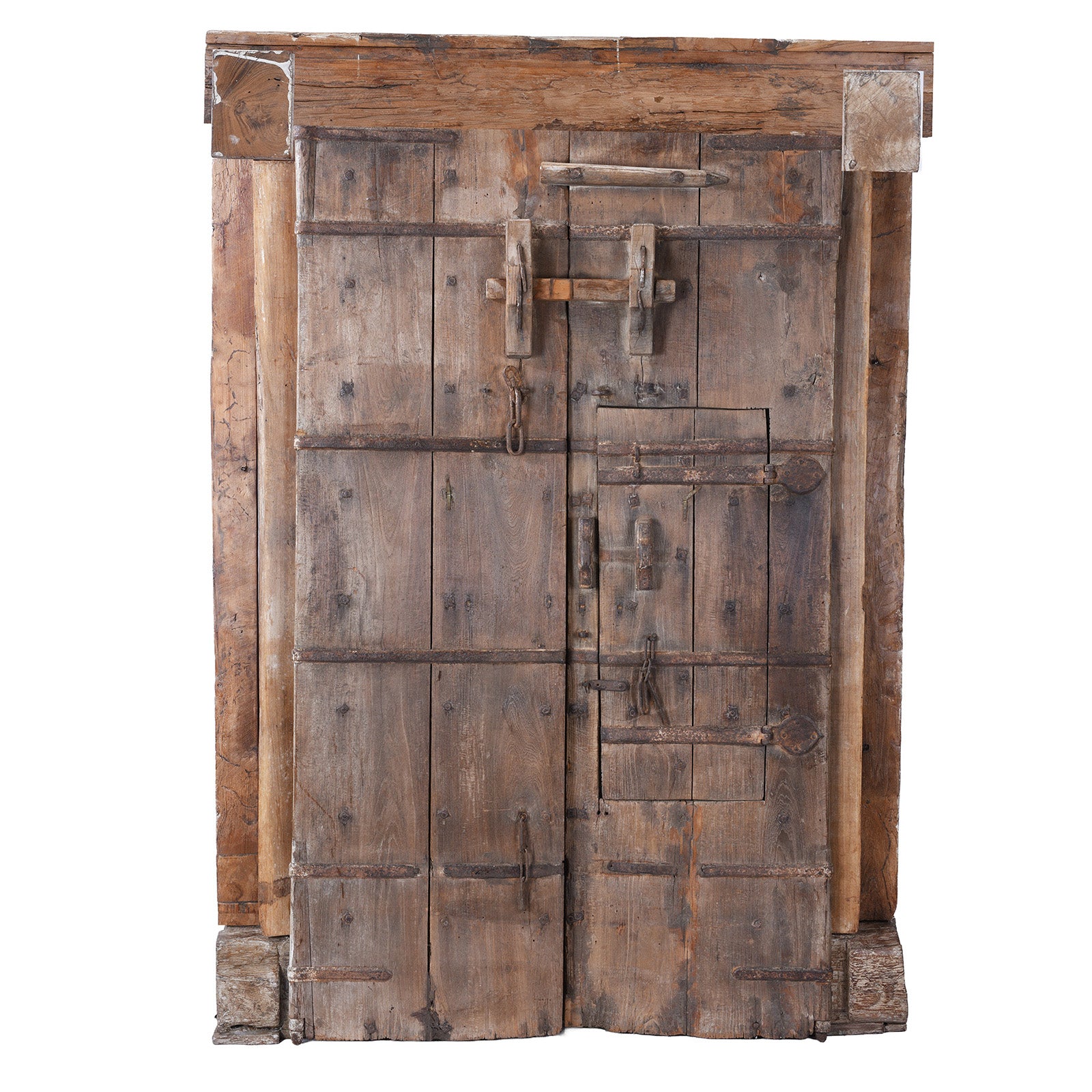 Back Of Antique 19Th Century Kutchi Teak Door And Carved Frame With Wicket Door And Lime Washed Finish From Gujarat India