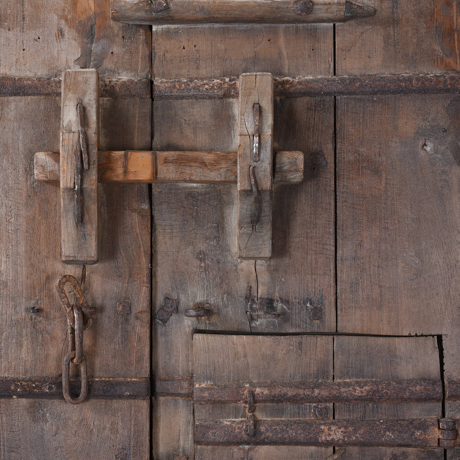 Lock Detail From Antique 19Th Century Kutchi Teak Door And Carved Frame With Wicket Door And Lime Washed Finish From Gujarat India