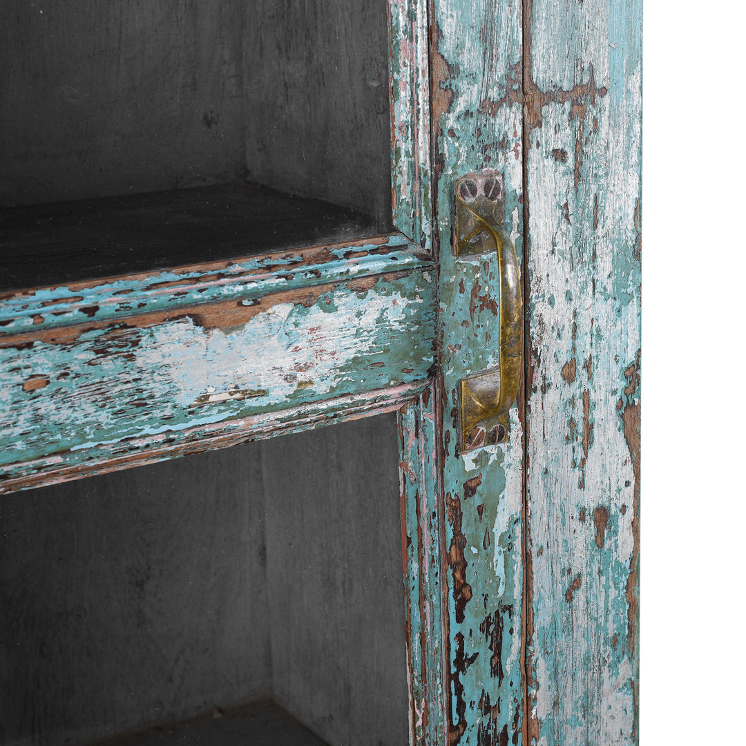 Door Handle Detail From Green painted Indian teak glazed cabinet circa 1920 with four sliding glass panels, three fixed shelves and distressed original paint | Indigo Antiques
