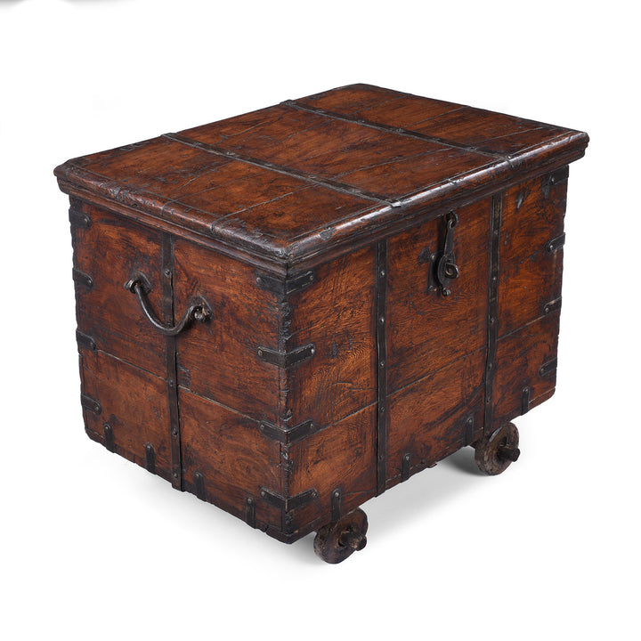 Angled VIew Of Antique Indian Iron Bound Teak Chest On Wheels | Indigo Antiques
