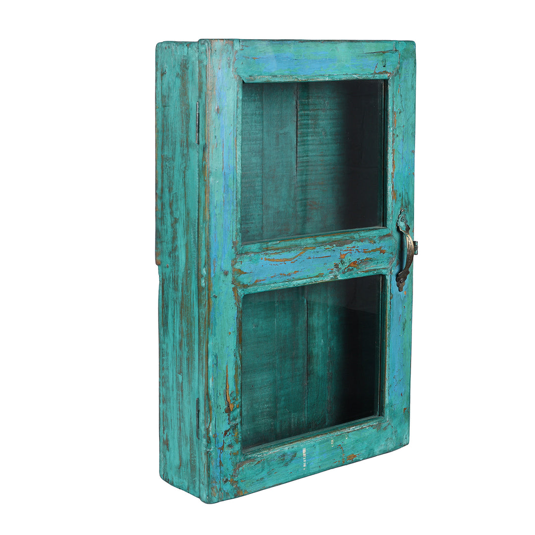 Angled VIew Of Green Painted Teak Glazed Wall Cabinet | Indigo Antiques