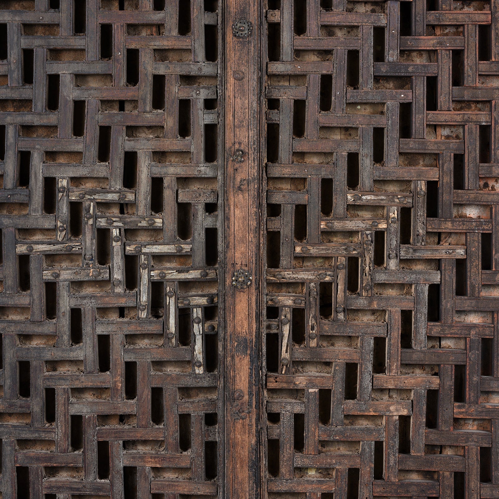 Detail From Centre Of 18th Century Teak Temple Door From Kota Rajasthan With Intricate Geometric Latticework And Original Iron Fittings | Indigo Antiques