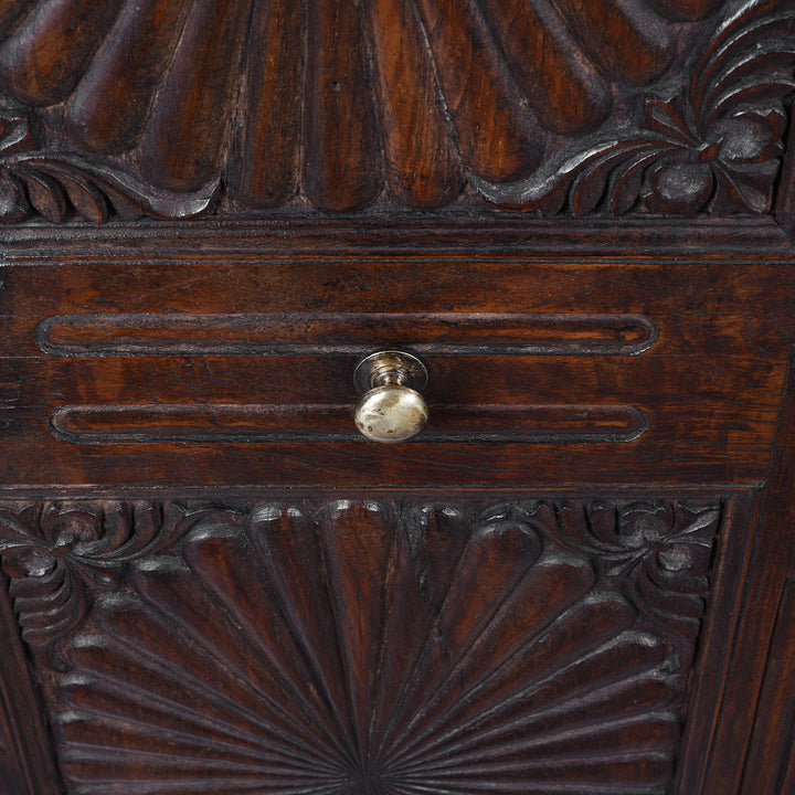 Handle Detail From 19th Century Indian Teak Almirah Cabinet With Deeply Carved Sunburst Panels And Indo Portuguese Influence