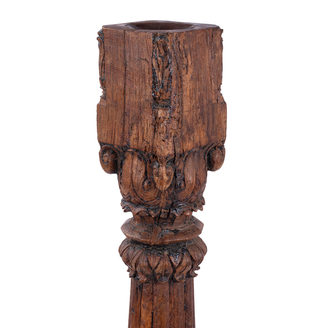 Detail From Tall 19th-century Indian carved teak architectural pillar converted into a floor-standing candlestick, with ornate floral carving, rich aged patina and metal candle dish.