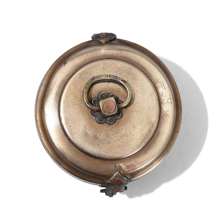 Top Down View Of Small Indian Brass Chapati Box With Ring Handle And Decorative Clasp Circa 1930s Vintage Kitchen Storage Container