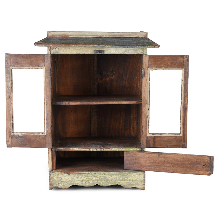 Interior View Of Green Painted 19th Century Indian Wall Cabinet With Glazed Doors And Drawer