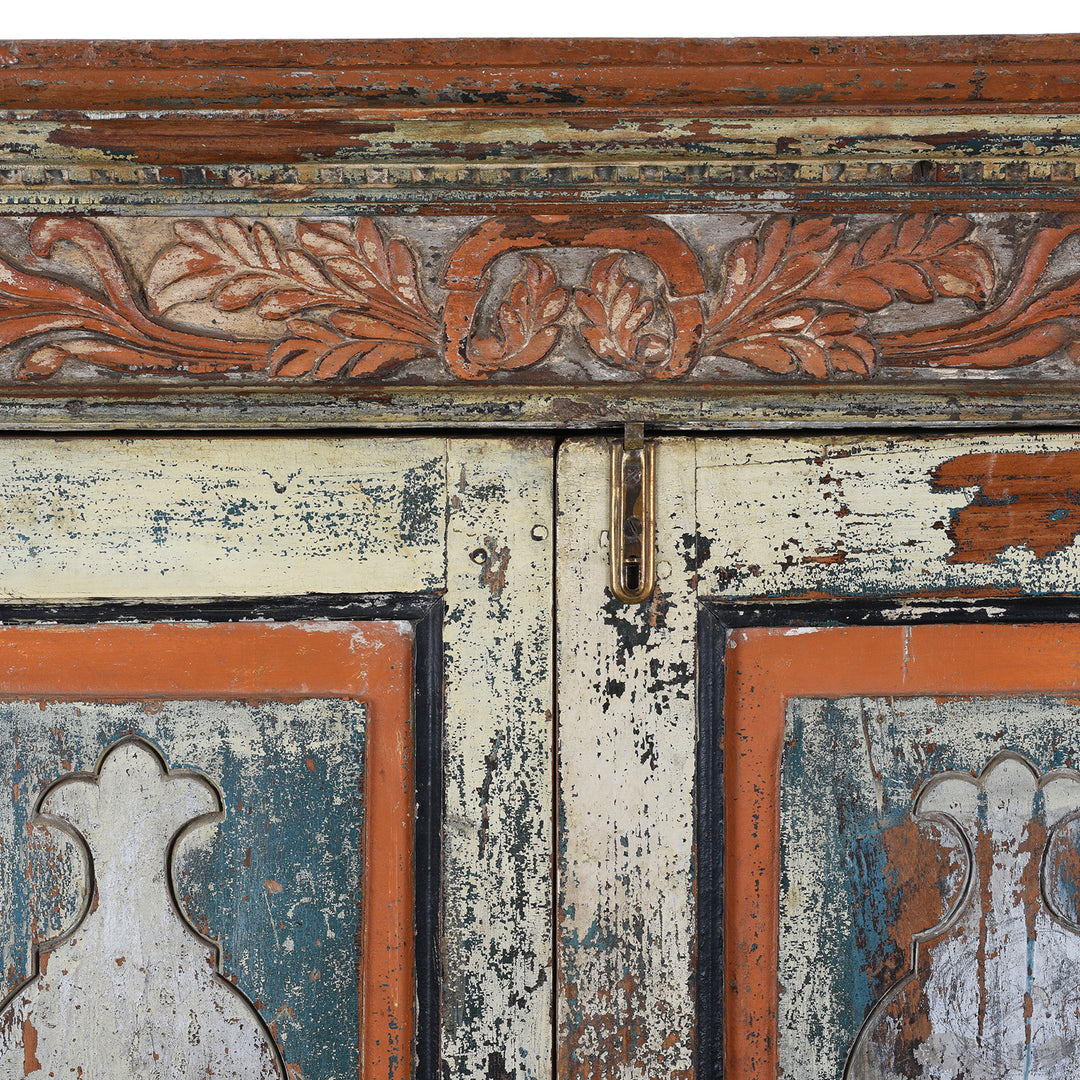 Carving Detail From Painted 19th Century Indian Almirah Cabinet With Distressed Cream Blue And Terracotta Finish Carved Frieze Three Shelves And Two Drawers | Indigo Antiques