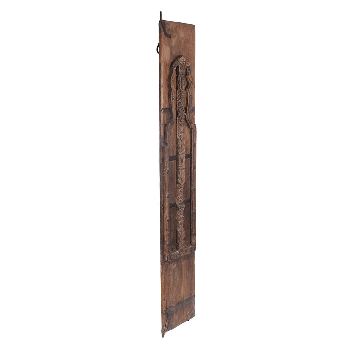 Angled VIew Of 19th Century Teak Window Shutter From Bikaner With Hand Carved Mughal Arch Detail And Aged Patina