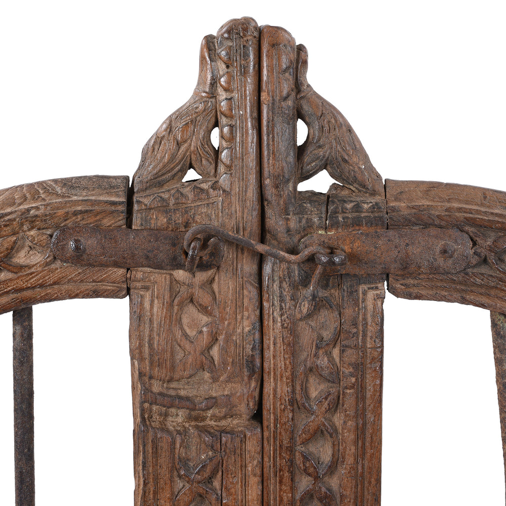 Cantral Carving Detail From 19th Century Carved Teak Haveli Dog Gate From Gujarat With Iron Bars And Floral Detailing
