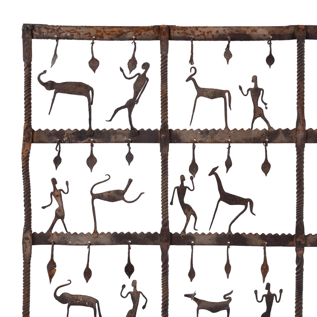 Corner Detail From Freestanding Bastar Iron Toran With Stylised Figures And Animals On Forged Stand