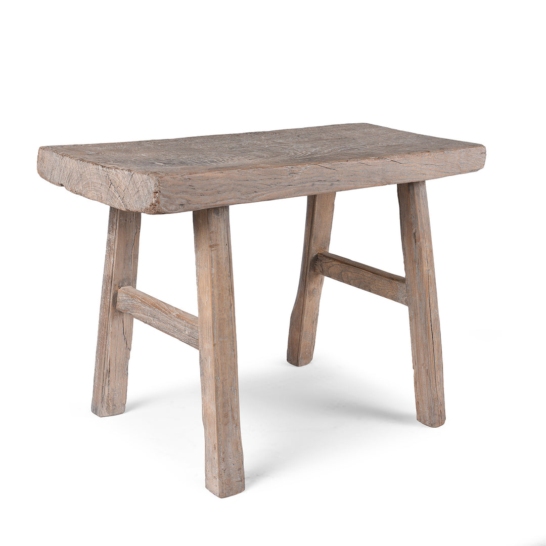 Angled VIew Of Antique 19th Century Henan Bleached Elm Farmers Stool With Thick Plank Seat And Rustic Patina