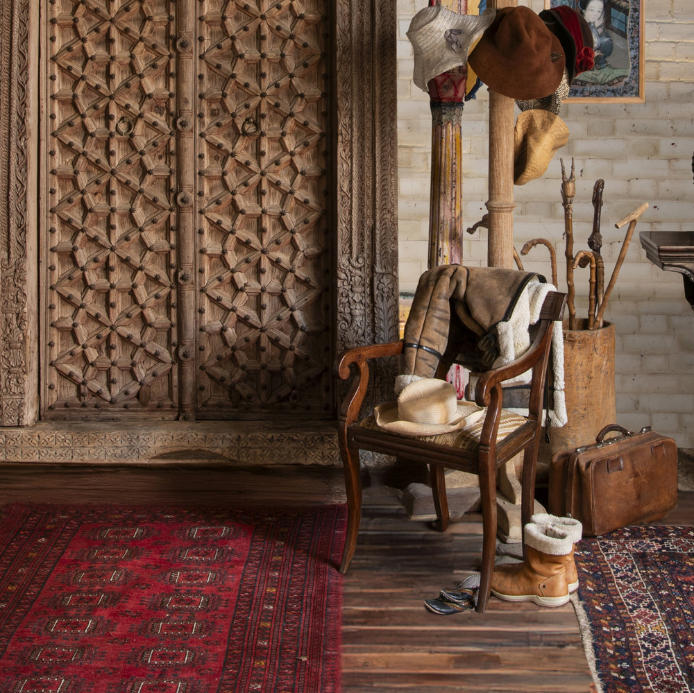 antique Indian interior with a regency chair 