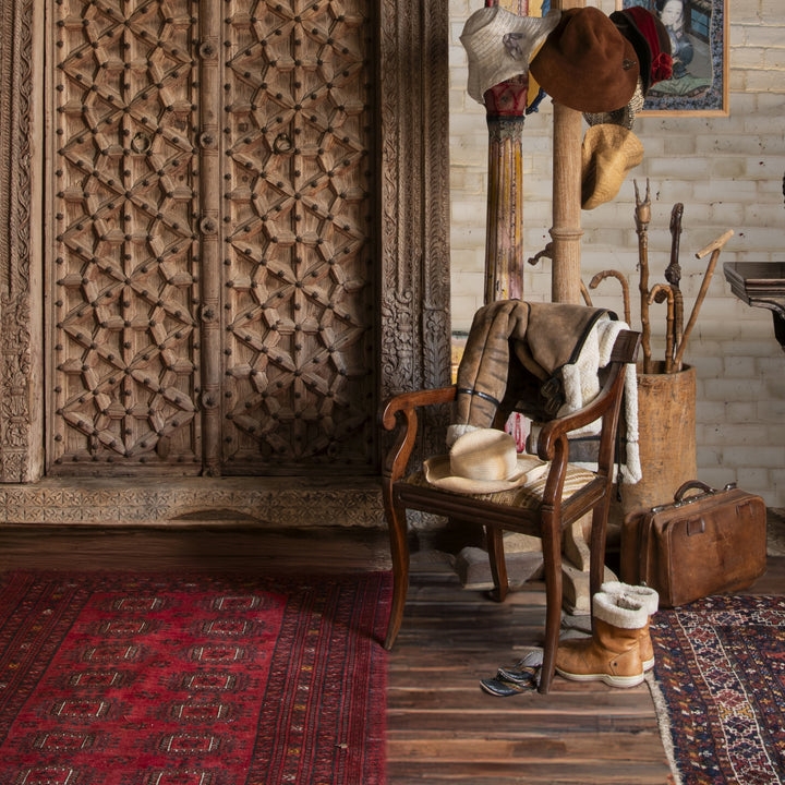 antique Indian interior with a regency chair 