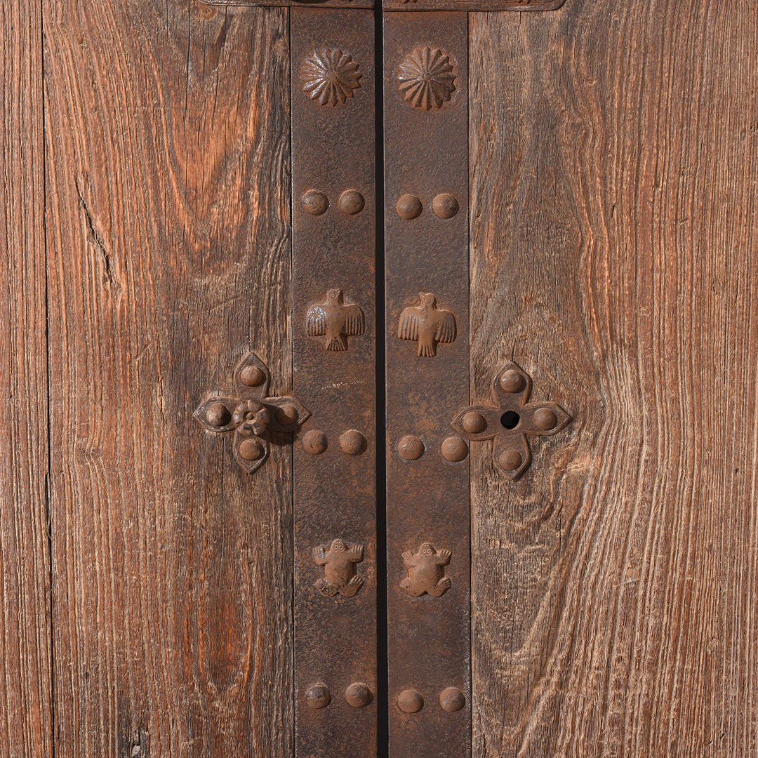 Ironwork bird, frog detail on an Antique Iron Chinese Bleached Elm Doors From Shanxi | Indigo Antiques
