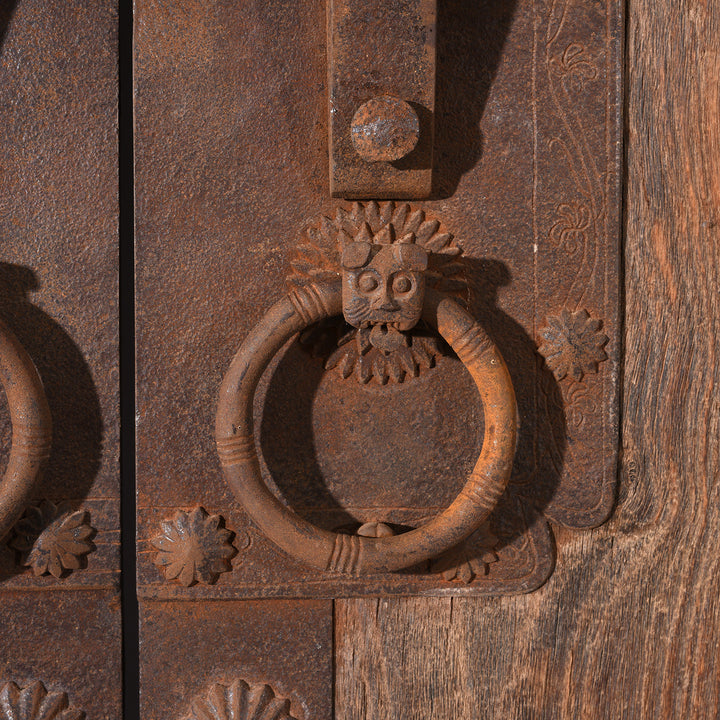 Iron knocker detail on an Antique Iron Chinese Bleached Elm Doors From Shanxi | Indigo Antiques