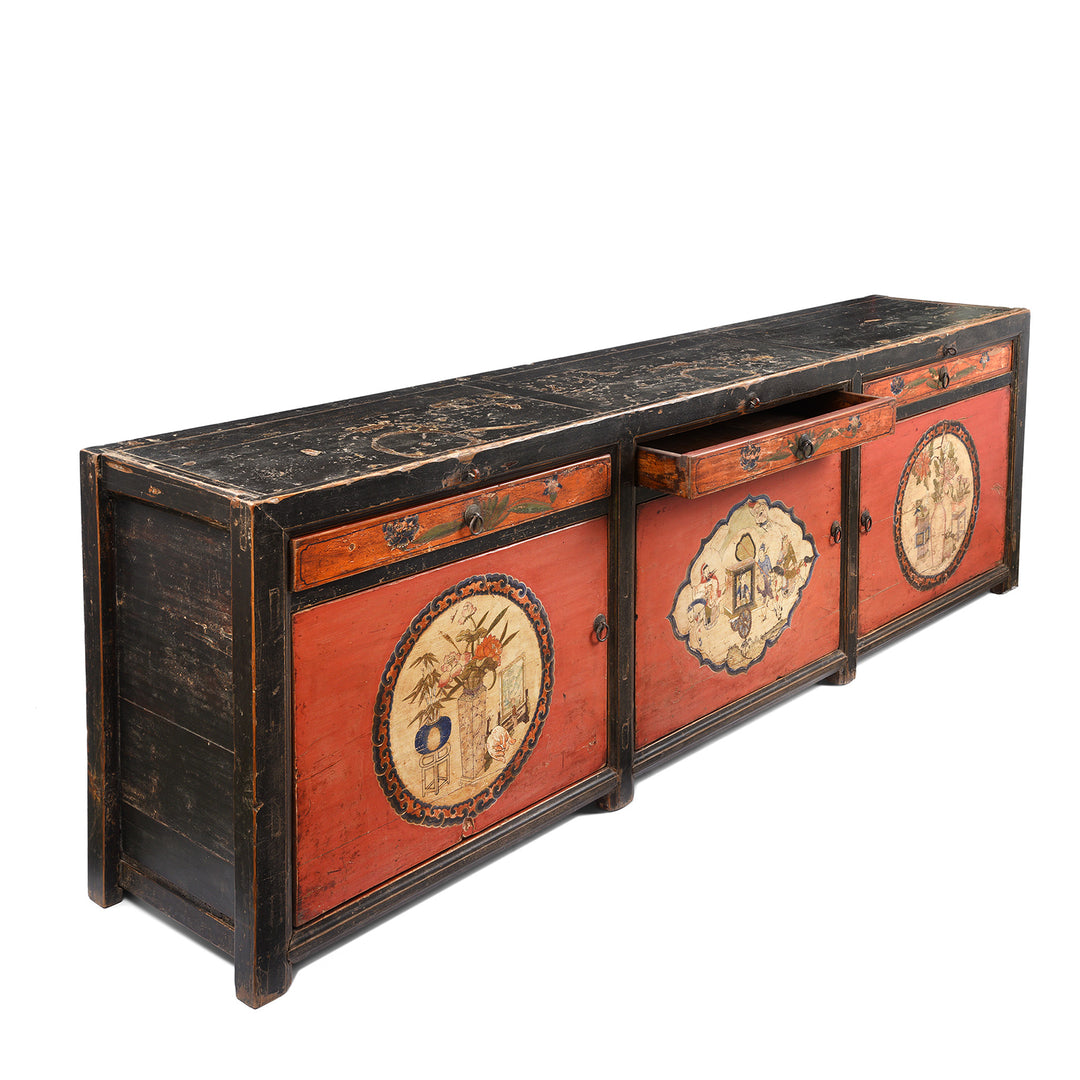 Angled View Of Antique Painted Red & Black Gansu Sideboard | Indigo Antiques