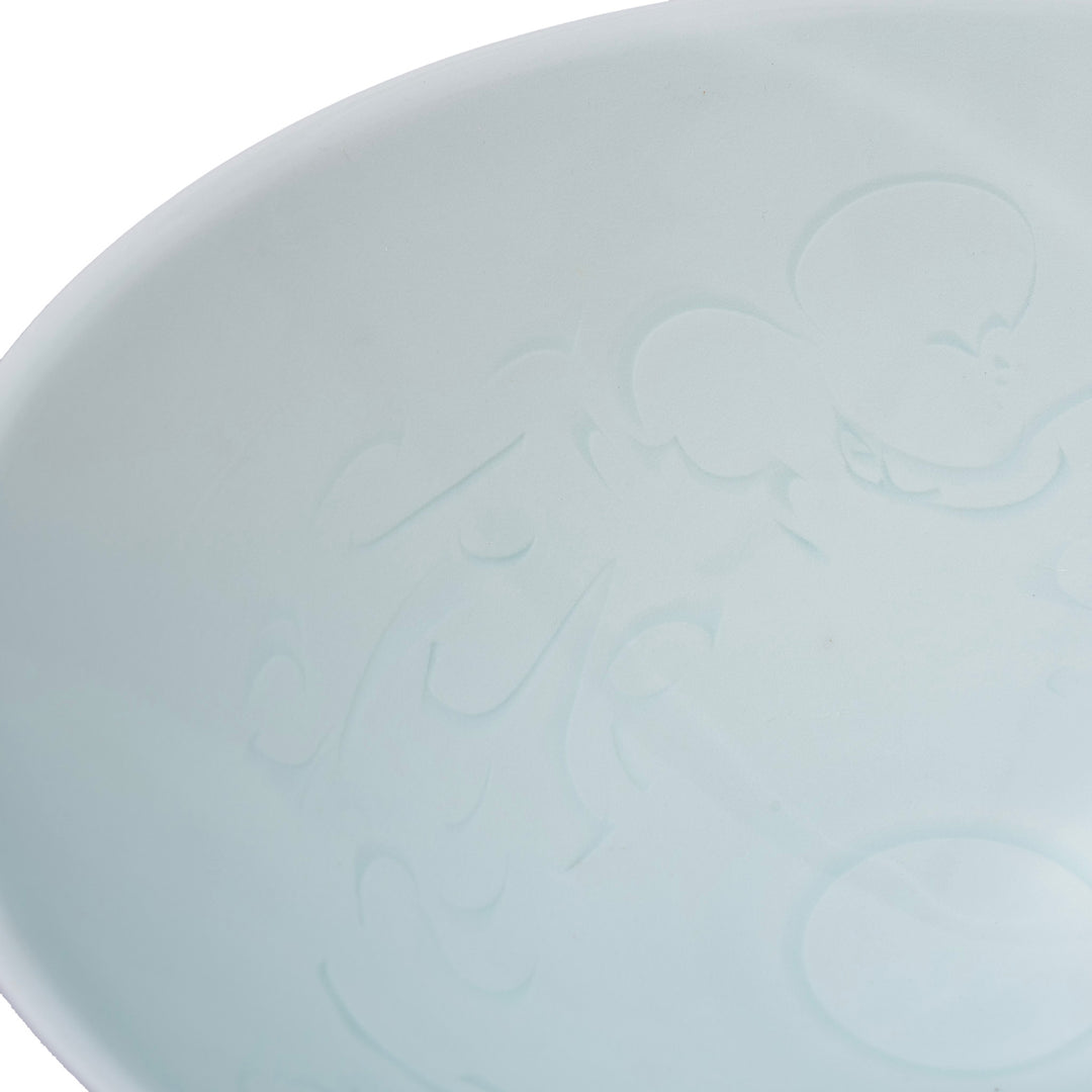 Detail From Flowing Floral Design Fine Glazed Celadon Porcelain Rice Bowl In Pale Jade Green With Hand Carved Song Dynasty Inspired Design