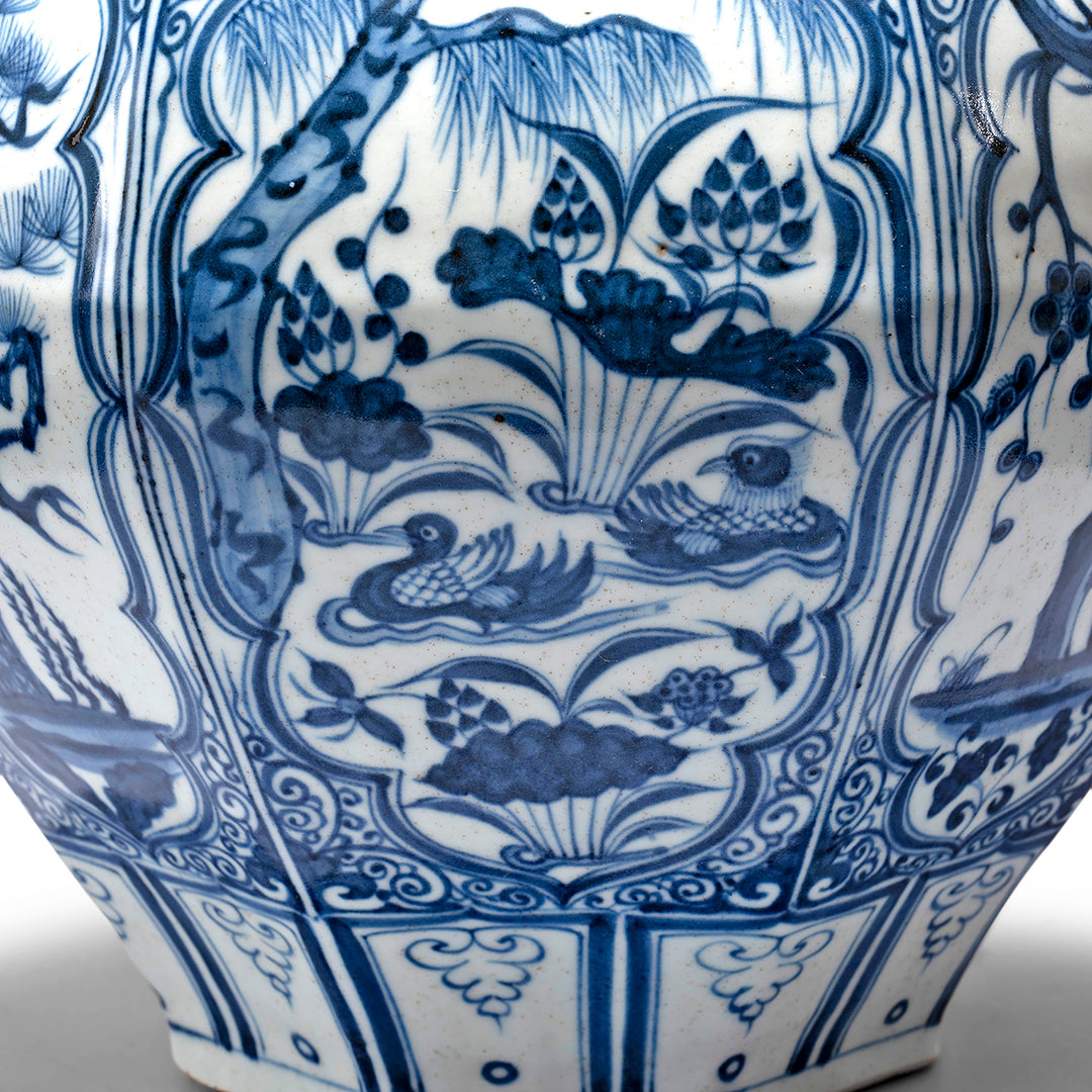 Duck pond and lotus painting on a Reproduction Chinese Cobalt Blue & White Porcelain Octagonal Wine Jar Vase | Indigo Antiques