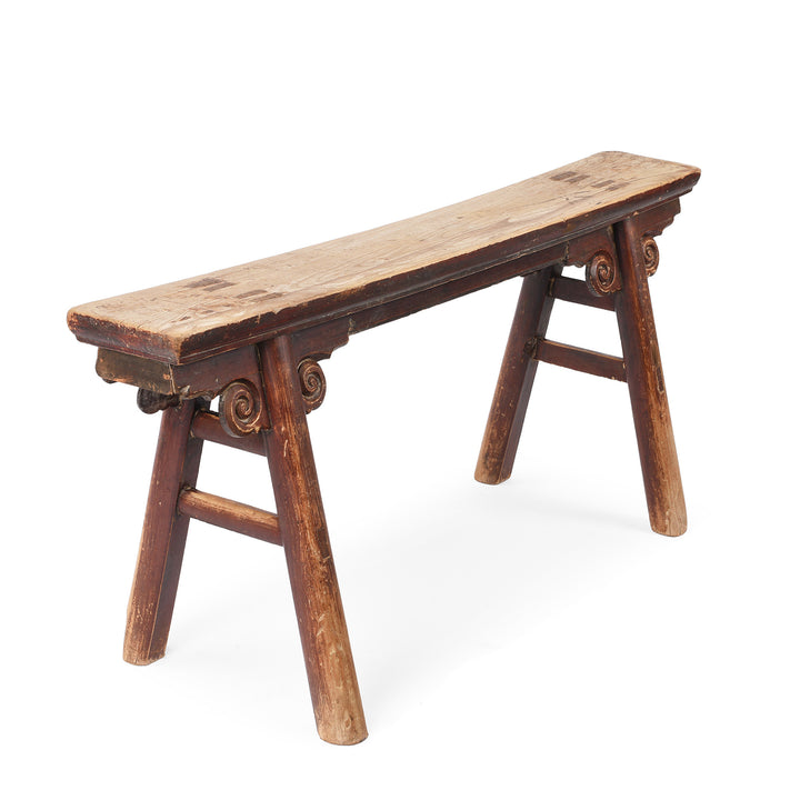 Angled View Of Antique Elm Chinese Spring Bench From Shanxi Province | Indigo Antiques