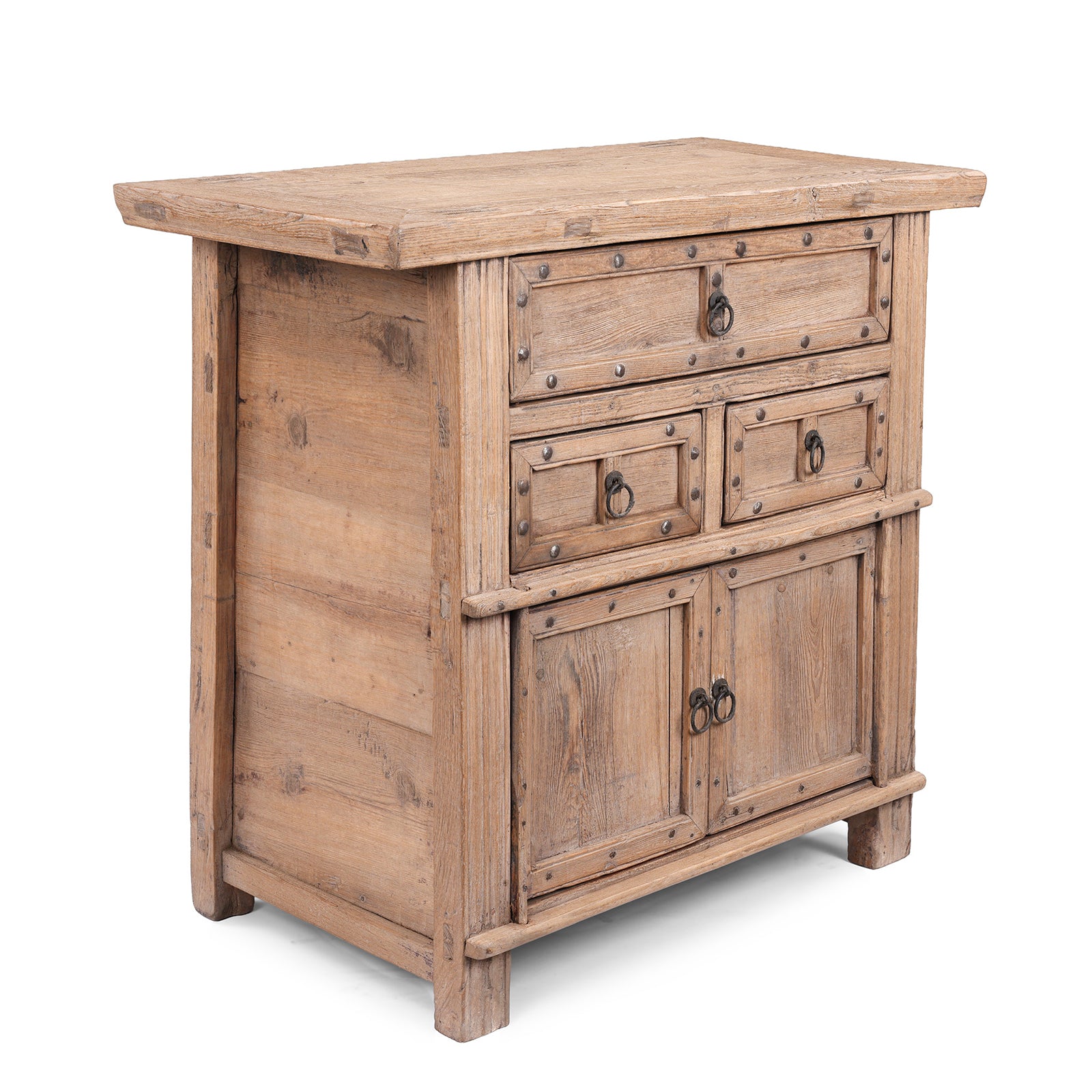 Angled View Of Bleached Elm Wood Cabinet From Shanxi China With Three Drawers And Lower Cupboard Featuring Iron Ring Pulls And Stud Detailing 19Th Century