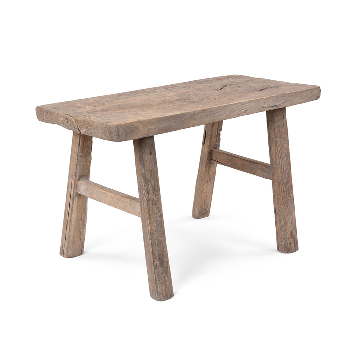 Angled View Of Bleached Elm Stool From Henan With Rustic Tapered Legs And Weathered Finish