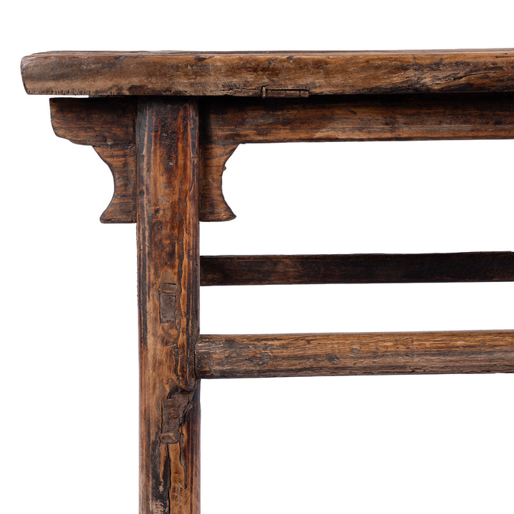 Corner Detail From Antique circa 1910 Chinese walnut farmhouse coffee table from Henan with thick plank top, traditional mortise-and-tenon joinery and rich aged patina.