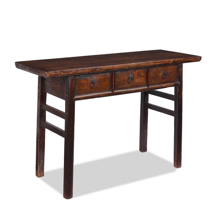 Angled VIew Of 19th Century Chinese Walnut And Elm Three Drawer Console Table From Shanxi Province With Ring Pull Handles | Indigo Antiques