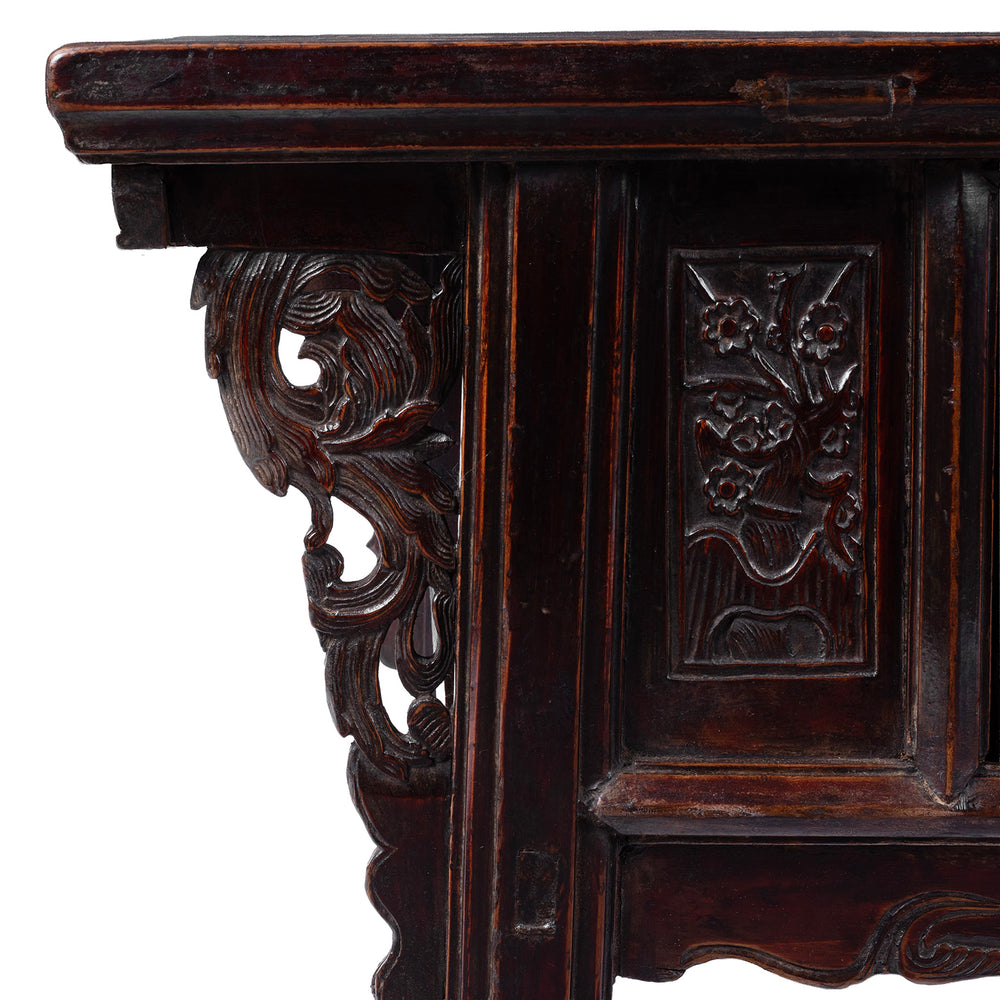Corner Detail Showing Carvings On Mid 19th Century Chinese Shanxi Black Lacquer Elm Kang Table With Floral Carvings And Cupboard Doors