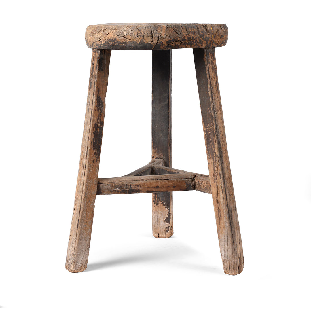 Vintage wooden stool on a white background