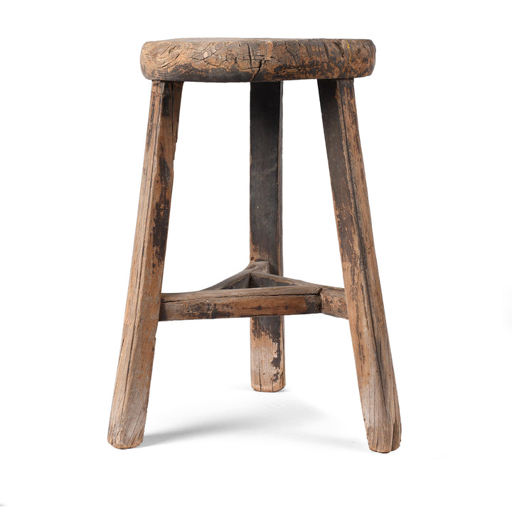 Vintage wooden stool on a white background