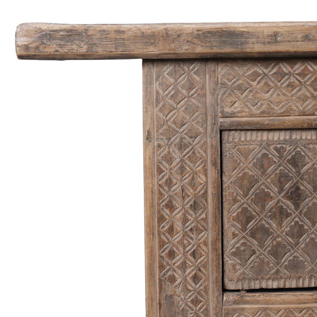 Corner Detail From Carved 19th Century Xinjiang Low Sideboard Converted From Daybed With Geometric And Floral Carved Panels And Iron Ring Pulls | Indigo Antiques